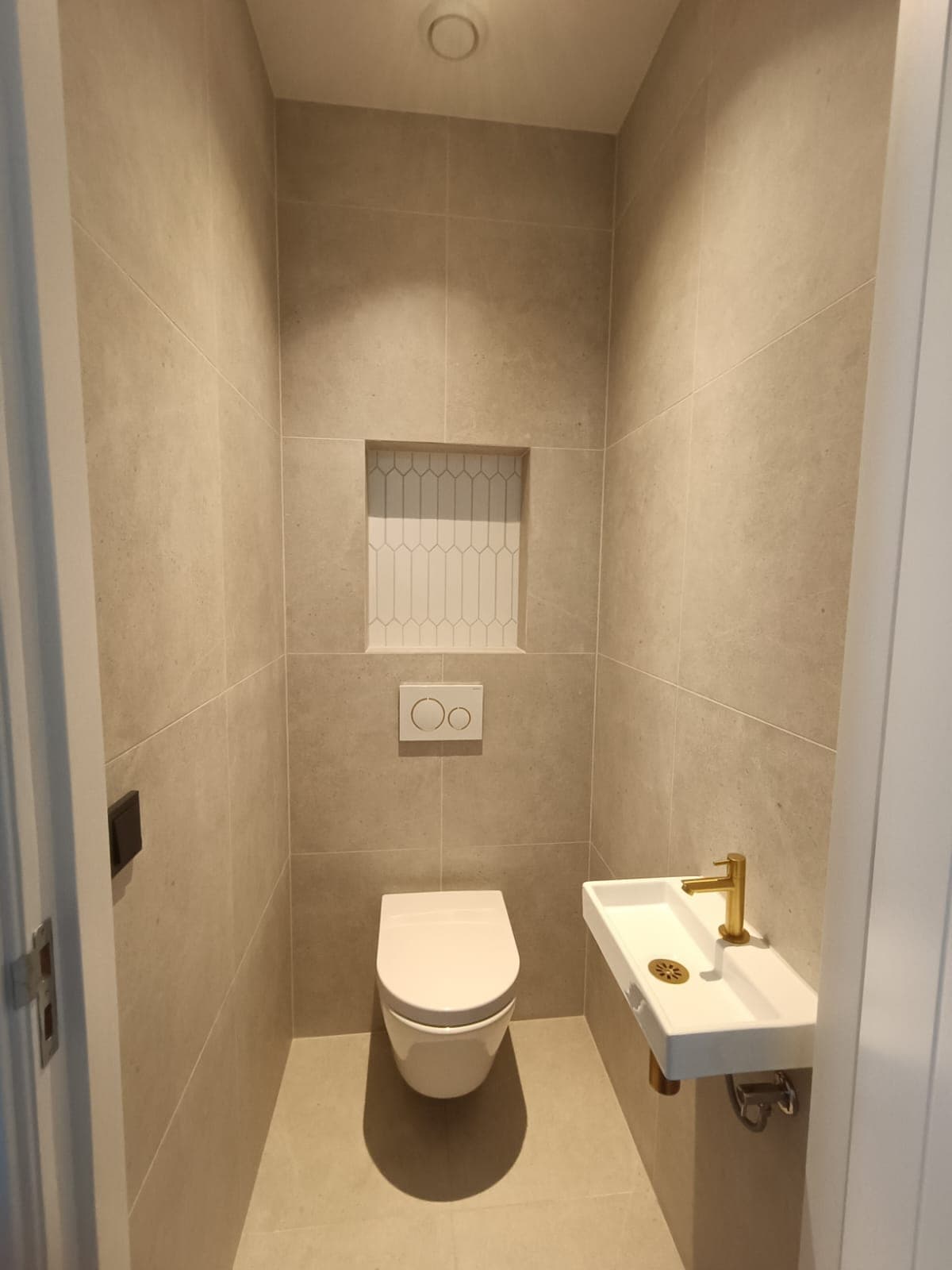 Detail van de badkamerrenovatie