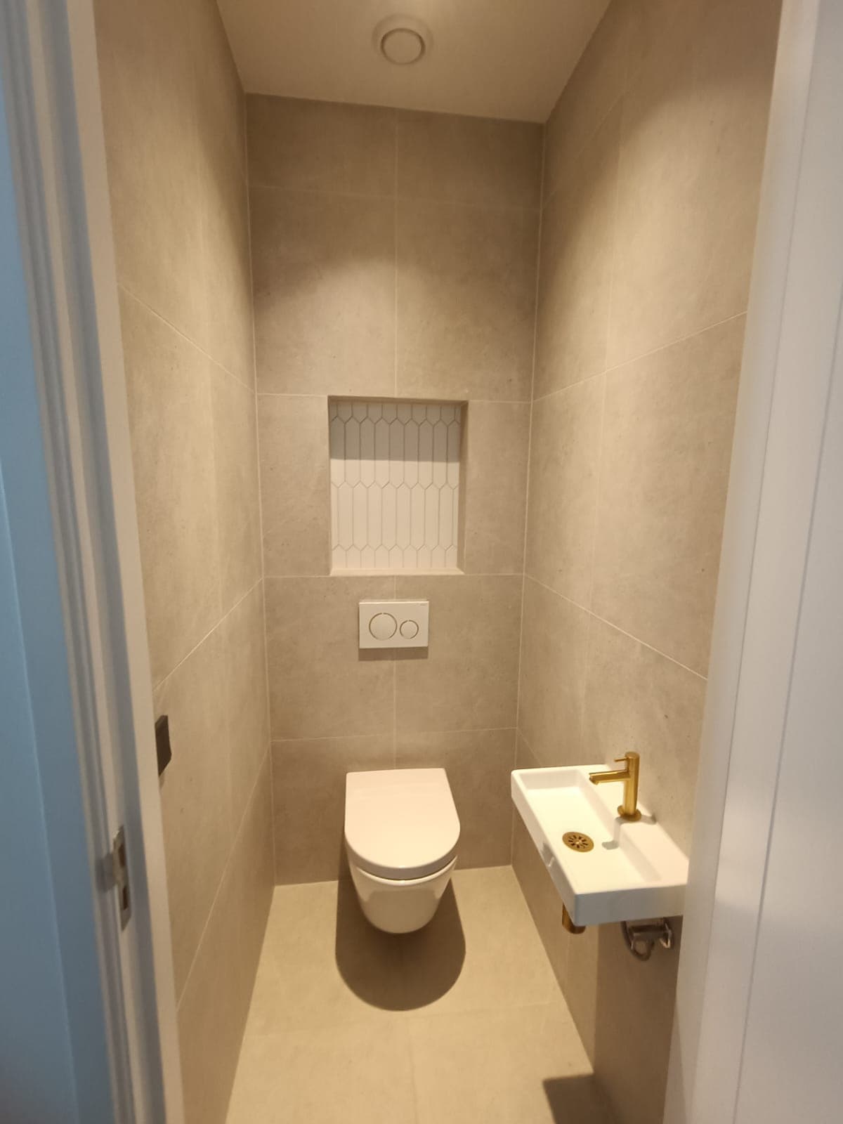Detail van de badkamerrenovatie